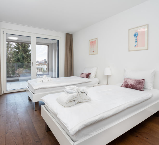 Bedroom décor at Interlaken Swiss Hotel Apartments