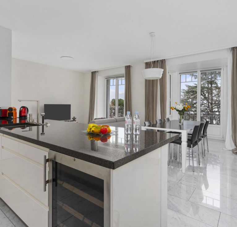Luxury kitchen and dining area Montreux Grand Rue Apartments