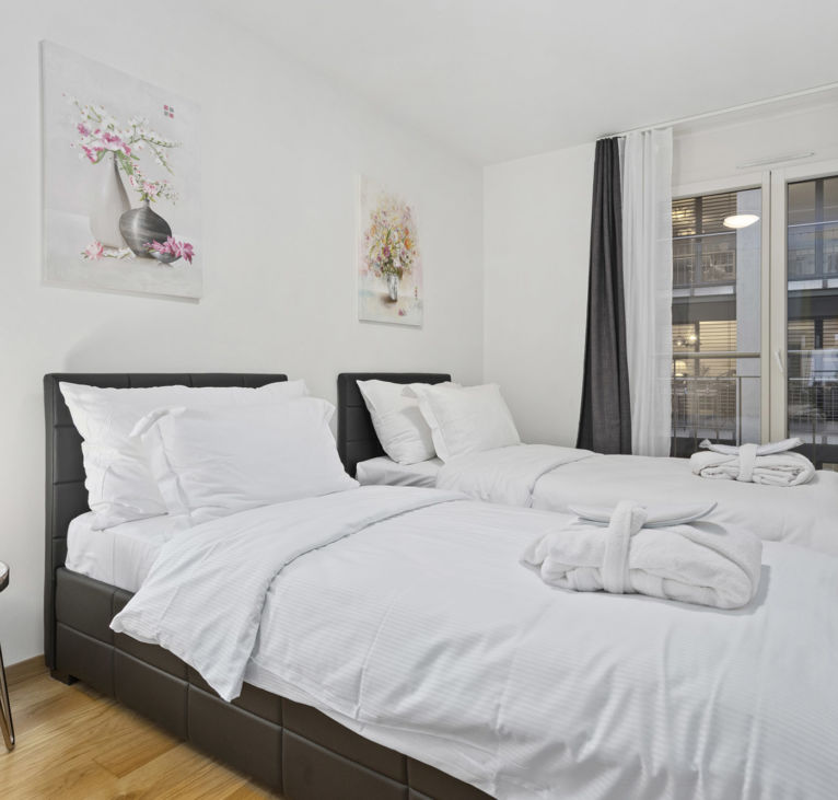 Twin bedroom accommodation at Montreux LUX Apartments
