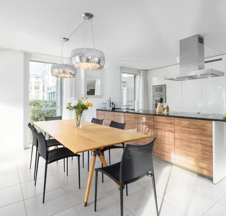 Kitchen and dining spaces by Montreux Lake View Apartments and Spa