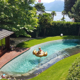 Swimming pool and garden area of Villa Rotana by Swiss Hotel Apartments