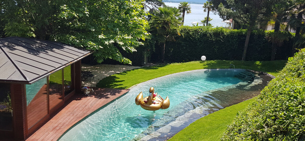 Swimming pool and garden area of Villa Rotana by Swiss Hotel Apartments