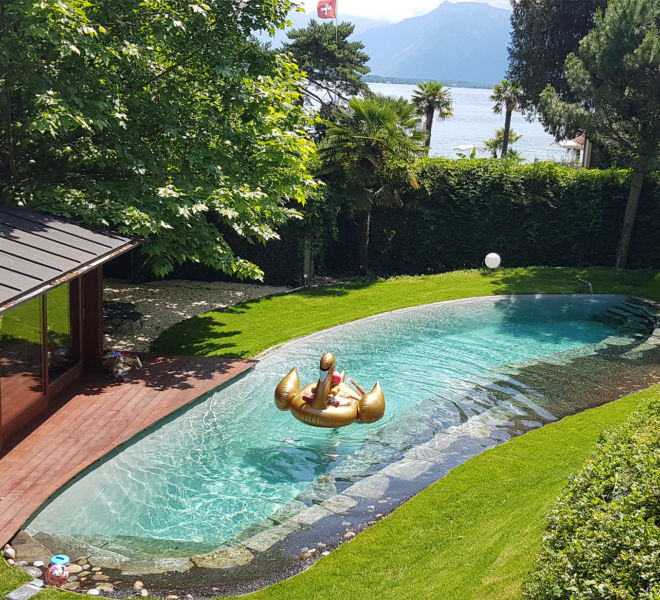 Schwimmbad und Gartenbereich der Villa Rotana by Swiss Hotel Apartments
