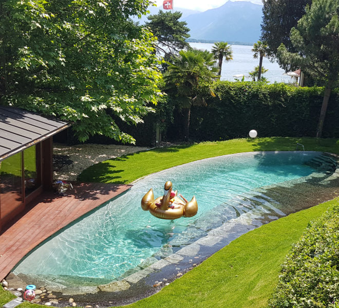 Swimming pool and garden area of Villa Rotana by Swiss Hotel Apartments