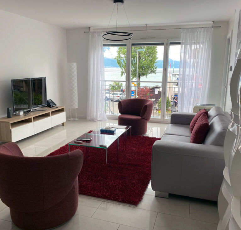 Modern living room area of Montreux LUX Apartments
