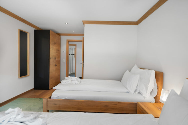 Chambre à deux lits Photo Chalet Alia Swiss Hotel Apartments