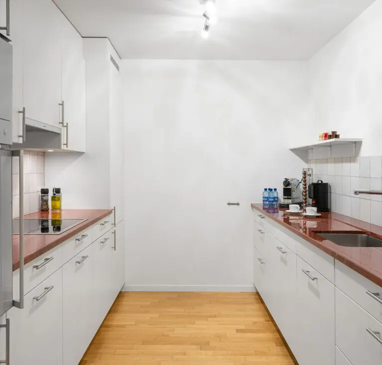 Fully-equipped kitchen of Montreux Lake View Apartments and Spa