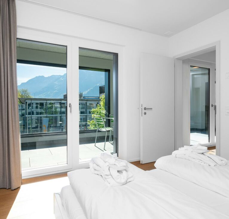 View from the bedroom of Interlaken Swiss Hotel Apartments
