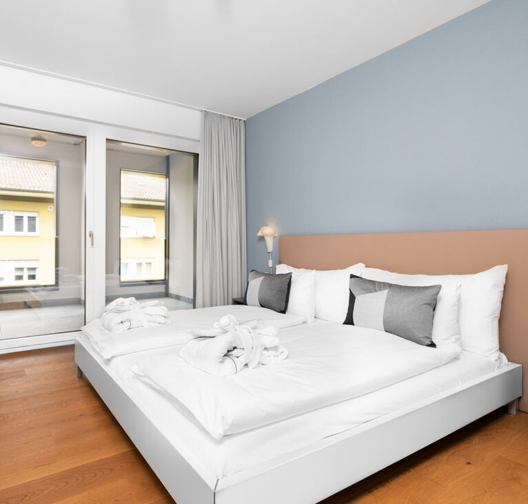 The bedroom of Interlaken Swiss Hotel Apartments