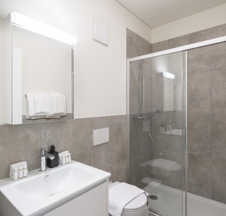 bathroom photo of the one bedroom apartment in Lugano Swiss Hotel Apartments