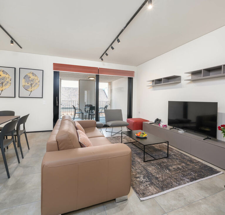 Luxurious and comfortable living room area Lugano Two Bedroom Apartment-Swiss Hotel Apartments 01