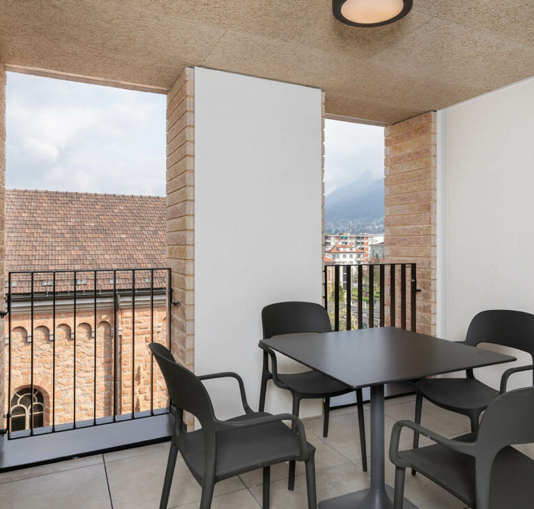 Balcony sitting area in Lugano Two Bedroom Apartment Swiss Hotel Apartments