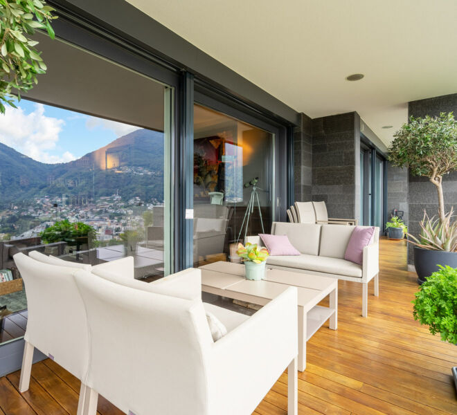 Balcone-Quattro camere da letto-Lugano-Vista lago-Appartamento-Spa-Hotel Svizzera-Appartamenti01