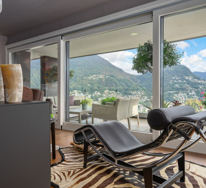 Livingroom-5-Cuatro-dormitorios-Lugano-Vista-Lago-Apartamento-Spa-Hotel-Apartamentos