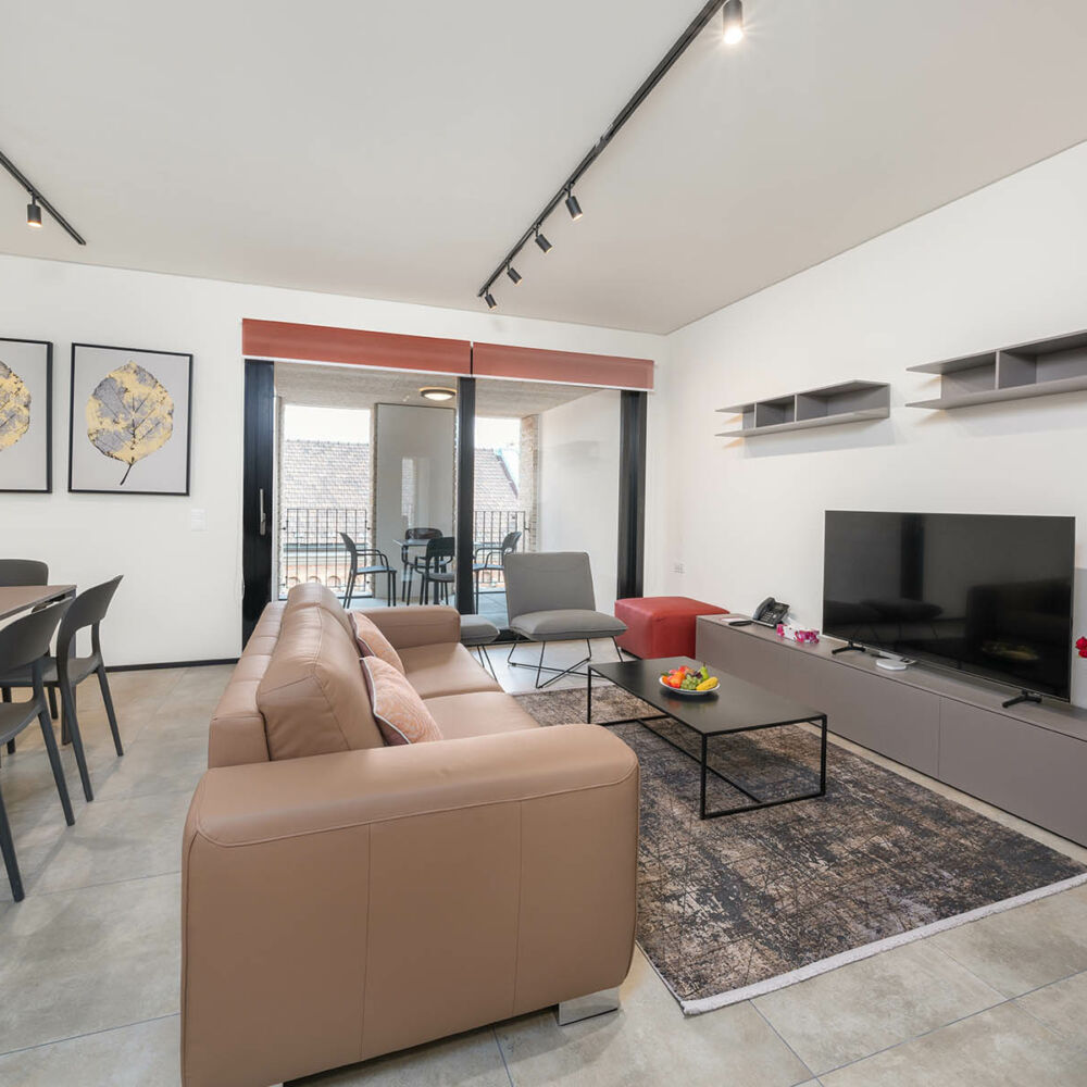 Luxurious and comfortable living room area Lugano Two Bedroom Apartment-Swiss Hotel Apartments 01