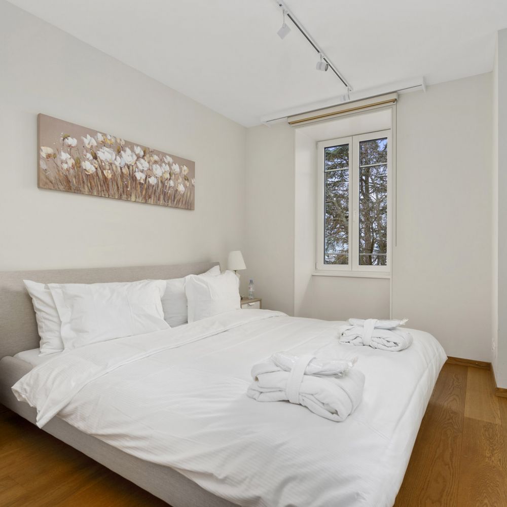 Elegantly designed bedrooms by Montreux Grand Rue Apartments